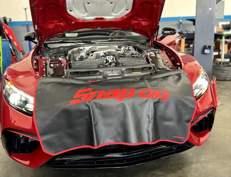 Mercedes-AMG engine under a Snap-on fender cover